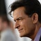 In posters for his upcoming film Machete Kills, Charlie Sheen is identified as Carlos Estevez, his birth name.
